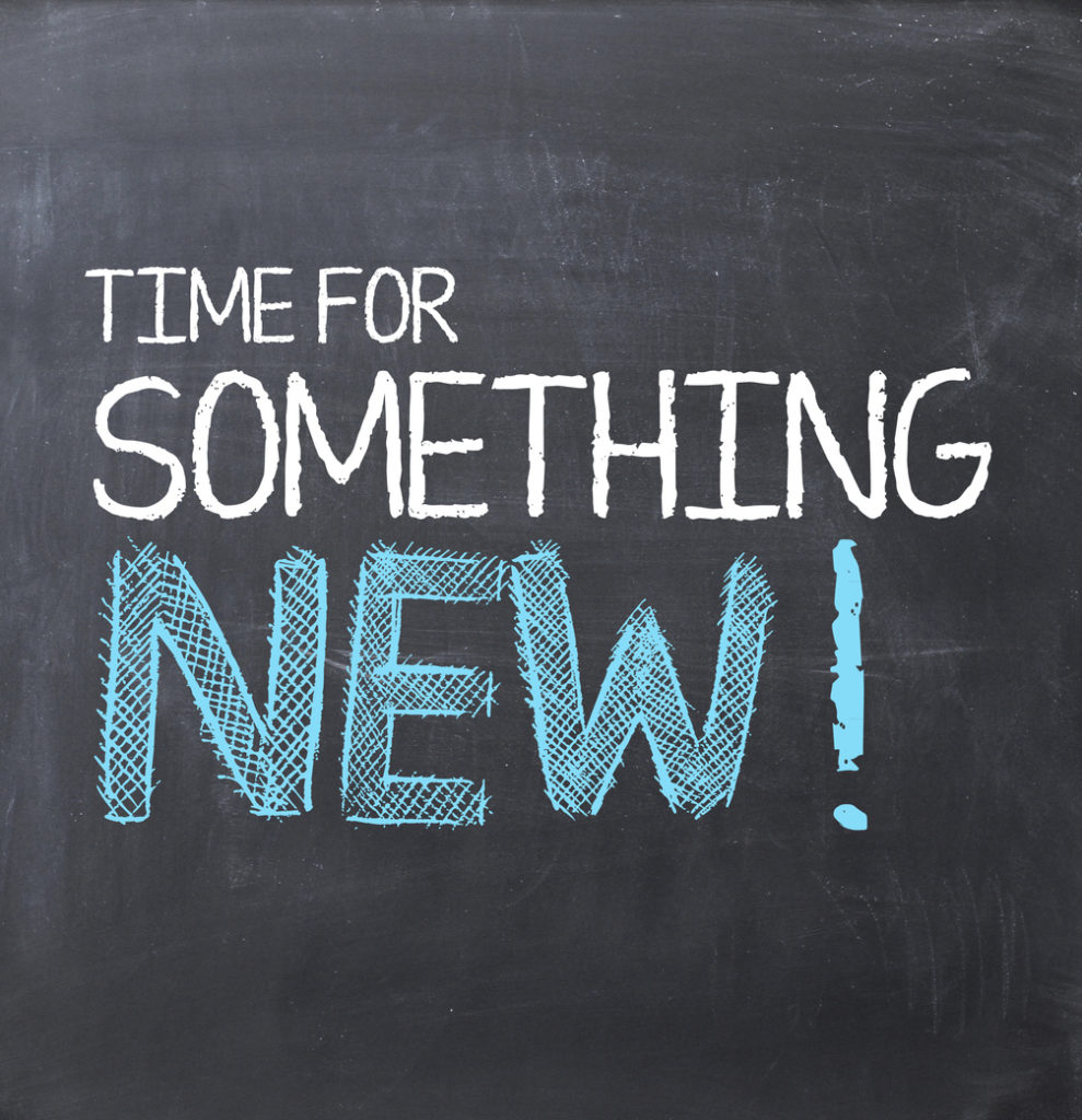 "Time for Something New!" message on chalkboard