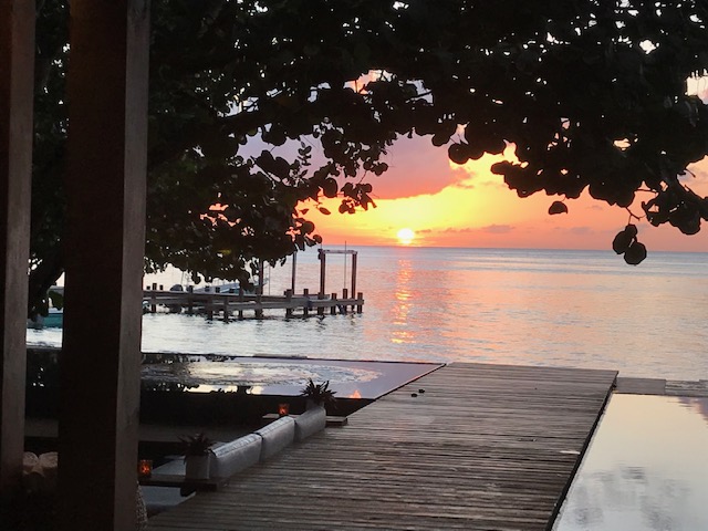 View of sunset in Roatan from Ibagari Resort. "Armchair travel" while in quarantine
